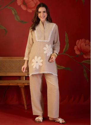 
                      Beige Embroidered Party Wear Kurti