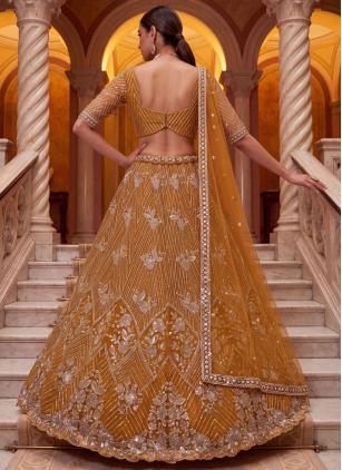 
                      Amazing Ceremonial Mustard Net Designer Lehenga Choli