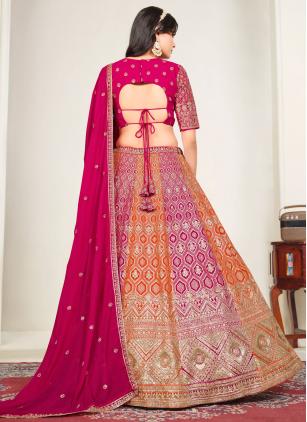 
                      Orange and Rani Designer Wedding Lehenga Choli