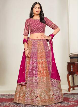
                      Orange and Rani Designer Wedding Lehenga Choli