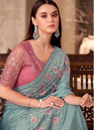 
                      Aqua Blue Embroidered Border Faux Georgette Classic Saree