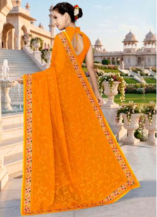 
                      Mustard Embroidered Georgette Classic Saree
