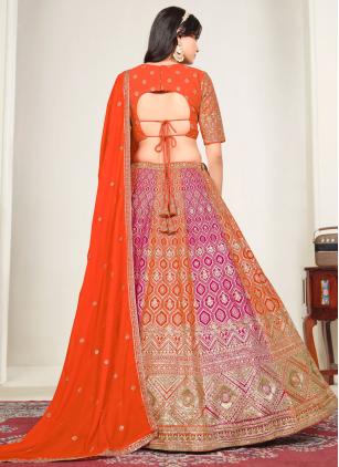 
                      Faux Georgette Rani and Orange Designer Lehenga Choli