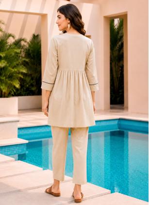 
                      Beige Embroidered Party Wear Kurti