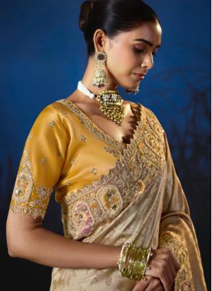 
                      Bridal Beige Embroidered Silk Classic Saree