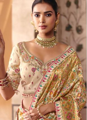 
                      Embroidered Cream Silk Classic Saree For Bride