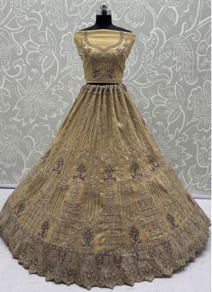 
                      Ceremonial Gold Net Designer Lehenga Choli For Engagement