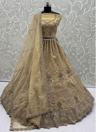 
                      Ceremonial Gold Net Designer Lehenga Choli For Engagement