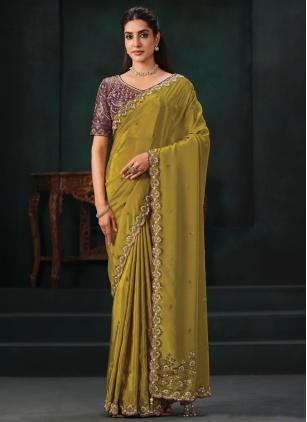 
                      Ceremonial Green Faux Crepe Satin Saree