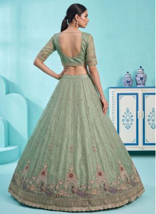 
                      Ceremonial Green Silk Embroidered Handwork Lehenga Choli