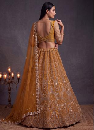 
                      Net Beads Work Mustard Designer Lehenga Choli