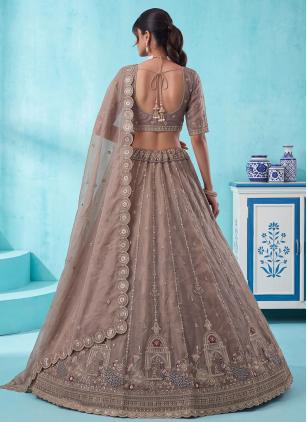 
                      Ceremonial Silk Embroidered Brown Lehenga Choli