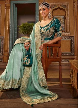 
                      Turquoise Embroidered Viscose Contemporary Saree