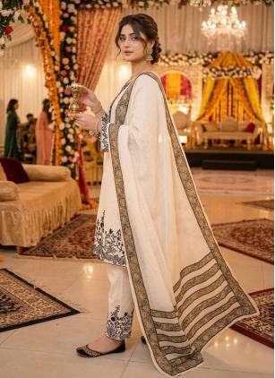 
                      Festival Off White Rayon Embroidered Salwar Kameez