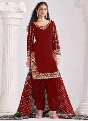 
                      Glorious Silk Embroidered Maroon Salwar suit