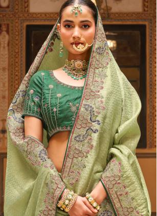 
                      Green Embroidered Tissue Trendy Saree For Wedding