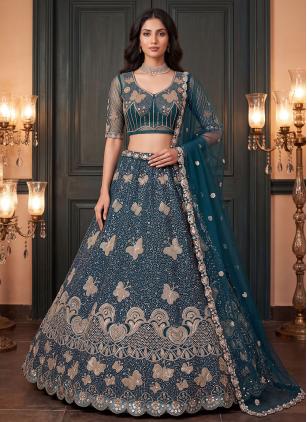 
                      Net Ceremonial Teal Embroidered Designer Lehenga Choli
