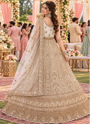 
                      Off White Beads Work Net Readymade Lehenga Choli