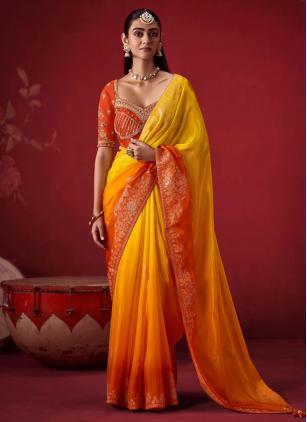
                      Orange and Yellow Crepe Silk Classic Saree