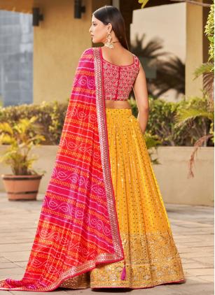 
                      Pink and Yellow Georgette Embroidered Lehenga Choli
