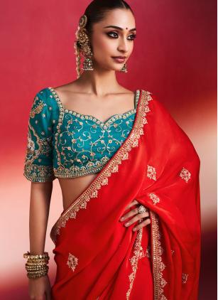 
                      Red Fancy Fabric Embroidered Trendy Saree
