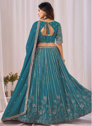 
                      Turquoise Ceremonial Embroidered Designer Lehenga Choli
