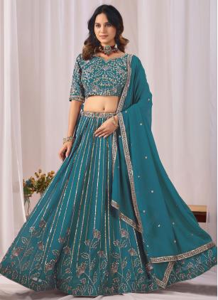 
                      Turquoise Ceremonial Embroidered Designer Lehenga Choli