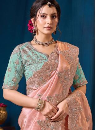 
                      Viscose Peach Embroidered Saree